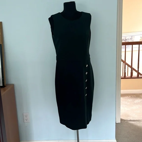 Karl Lagerfeld Paris size 6 forest green dress. Rhinestone buttons on skirt.